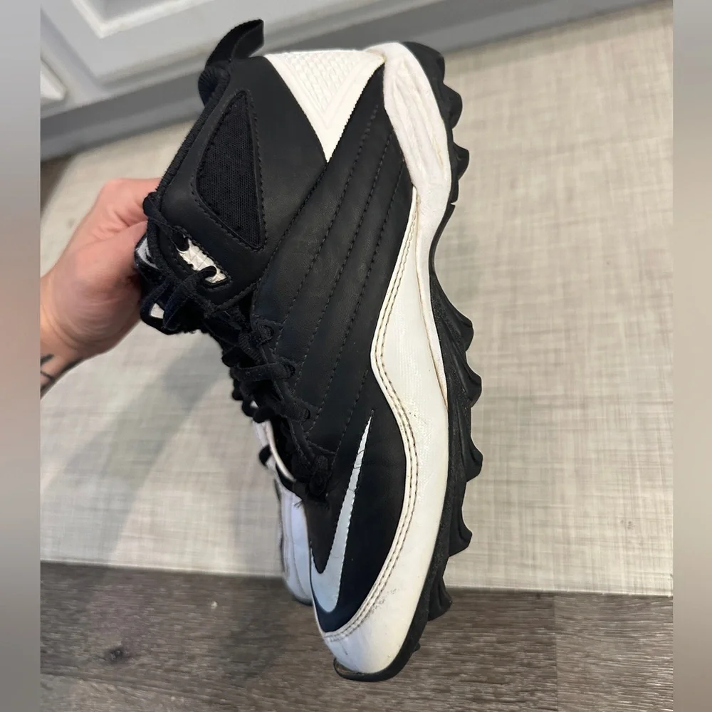 Nike Speed Shark 3/4 Football cleats in black and white.